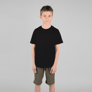 A black youth t-shirt displayed on a model standing against a neutral background, paired with khaki shorts.
