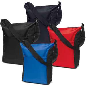 A collection of four cooler bags in black, navy, red, and blue, each with a shoulder strap and front pocket.