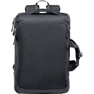 A black laptop backpack with padded straps, a top handle, and a logo on the front.