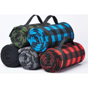 A stack of rolled fleece blankets in green, blue, grey, and red plaid patterns, each with a carrying handle.