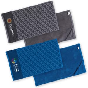 Three gym towels in various shades of blue and grey, featuring different patterns and logos.