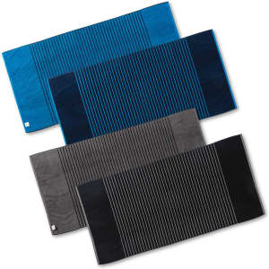 Reversible two-tone towels in blue, grey, and black with a striped design; includes branding.