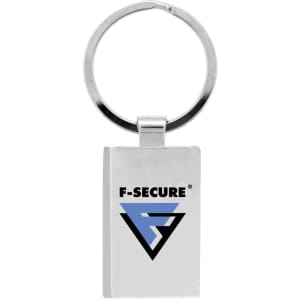 A silver keychain with a rectangular shape featuring a logo on one side.
