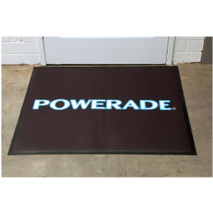 A black floor mat with a logo featuring the word "POWERADE" in light blue.