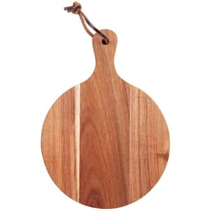 A round wooden cheeseboard featuring a natural finish and a leather strap for hanging.