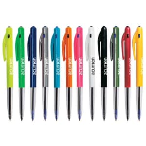 A row of clicked plastic pens in various colours, including green, blue, orange, white, black, and red, featuring logos.