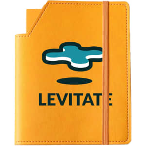 A leatherette notebook in orange with a logo on the front and an elastic closure.