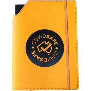 A yellow leatherette notebook cover with a black circular logo and an elastic band closure.