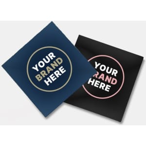 Two glossy paper stickers, one navy blue and one black, each featuring a circular design with a logo.