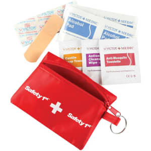 A red zippered pouch containing an alcohol pad, bandage, antiseptic wipe, castile soap towel, and anti-mosquito towelette.