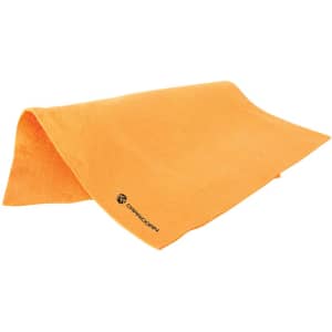 A large orange chamois bath towel with a logo on one edge.