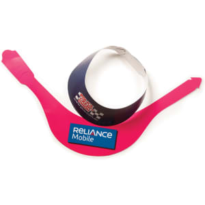 A pink sun visor with a black band and a logo. The visor has a curved shape and adjustable ends.