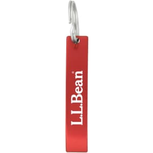 A drink bottle opener in red with a silver keyring, featuring a logo on one side.