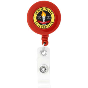 A round red badge holder with a clear strap and a logo in the centre.