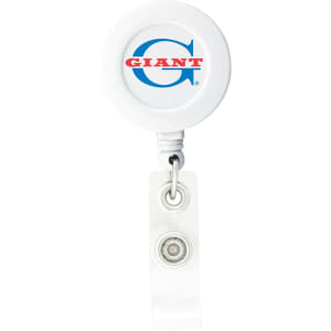 A round white badge holder with a retractable mechanism and a logo on the front.