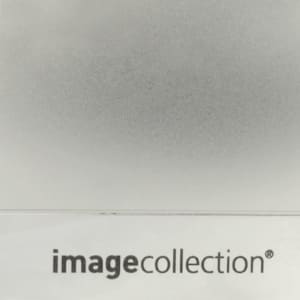A sleek, silver deluxe pocket business card holder with a branding logo at the bottom.