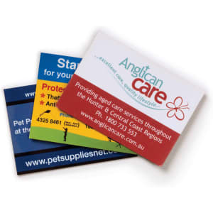 A set of three fridge magnets in various colours, featuring logos and promotional text for services.