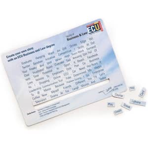 A magnetic board with a cloudy sky background, featuring small magnetic word tiles in white and blue.