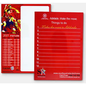 A red magnetic whiteboard featuring a blank writing surface and a list template on one side, with a logo.