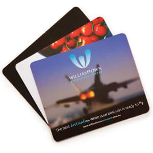A mouse mat set featuring three designs, prominently displaying a logo and various colourful images, primarily red and green.
