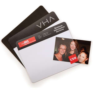 A collection of mouse mats in black and white, featuring logos and a photo on one mat.