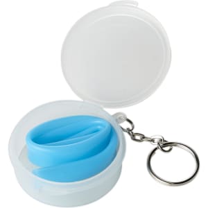 A blue reusable silicone straw in a clear, round case with a keyring attachment.