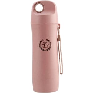 A drink bottle in a soft pink colour, made from wheat straw, featuring a logo and a convenient carry strap.