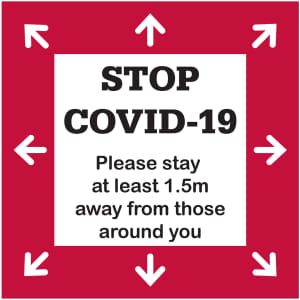 A floor decal sticker in red and white, featuring arrows and a message about maintaining social distance.