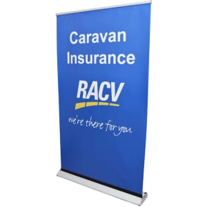 A blue roll-up banner featuring text and a logo, promoting Caravan Insurance with a sleek silver base.