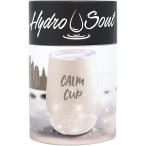 A drink bottle in a round container, featuring a white Calm Cup with a clear lid and a branding logo on top.