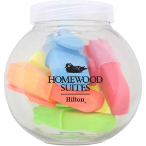 A clear jar filled with highlighters in pink, yellow, green, and blue, featuring a logo on the front.