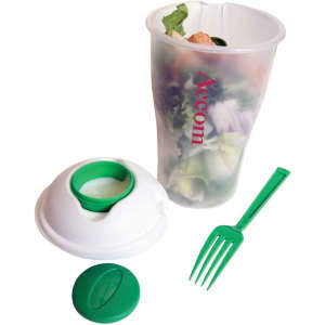 A transparent salad shaker with a white lid, green fork, and a logo, filled with mixed salad ingredients.