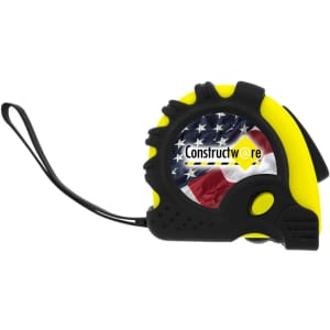 A tape measure in black and yellow, featuring a design with the American flag and a branding logo.