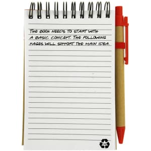 A recycled jotter pad with lined pages and a red pen attached, featuring a spiral binding.