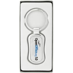 A silver keychain with a rounded rectangular design inside a white box, featuring a logo.