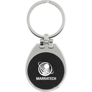 A silver keychain with a black leather-like section featuring a logo. The keychain has a circular ring for keys.