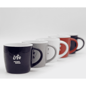 A ceramic mug collection featuring black, grey, white, and red mugs, each with a logo design.