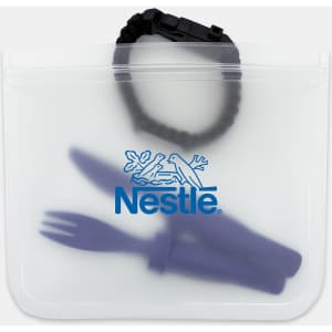 A clear PEVA reusable food storage bag containing a green fork and knife, with a black wristband visible inside.