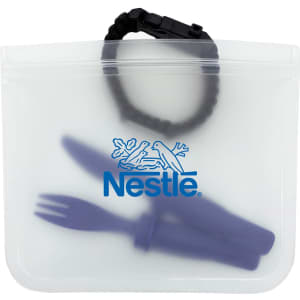 A translucent white reusable food storage bag containing a purple fork and spoon, with a bracelet and a logo.