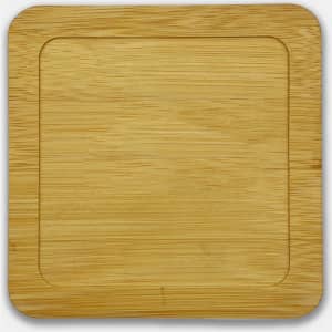 A bamboo coaster with a smooth, natural finish, featuring rounded edges and a recessed centre.