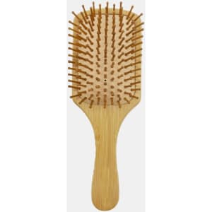 A bamboo hairbrush with a wooden handle and bristles, featuring a rectangular paddle design.