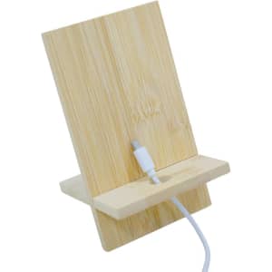 A bamboo phone stand with a slot for charging, featuring a natural wood finish and clean design.