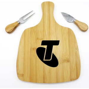 A bamboo cheeseboard with a logo and two stainless steel knives featuring wooden handles.