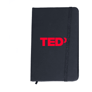A black notebook with an elastic band closure and a red logo on the front.