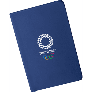 A navy A5 notebook featuring Olympic branding on the cover.