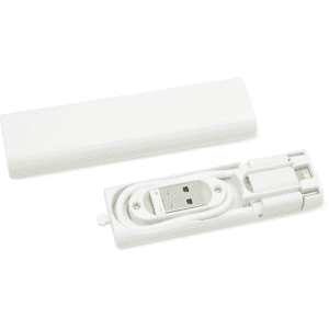 A white travel kit containing a neatly wrapped charging cable and a protective case.