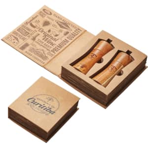 A salt and pepper set in wooden-coloured holders, presented in a decorative box with branding.