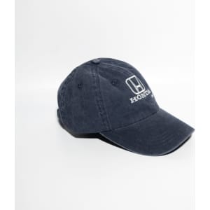 A navy denim cotton baseball cap with an adjustable buckle strap and a logo on the front.