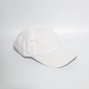 A white denim cotton baseball cap with a buckle strap and a logo on the side.