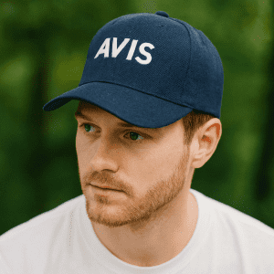 A navy blue baseball cap with a structured design and a logo on the front.